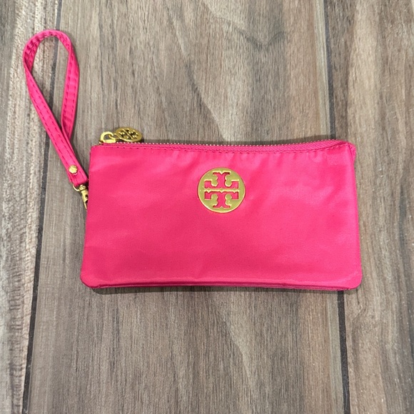 Tory Burch Handbags - Tory Burch Vibrant Pink Wristlet with Gold Logo